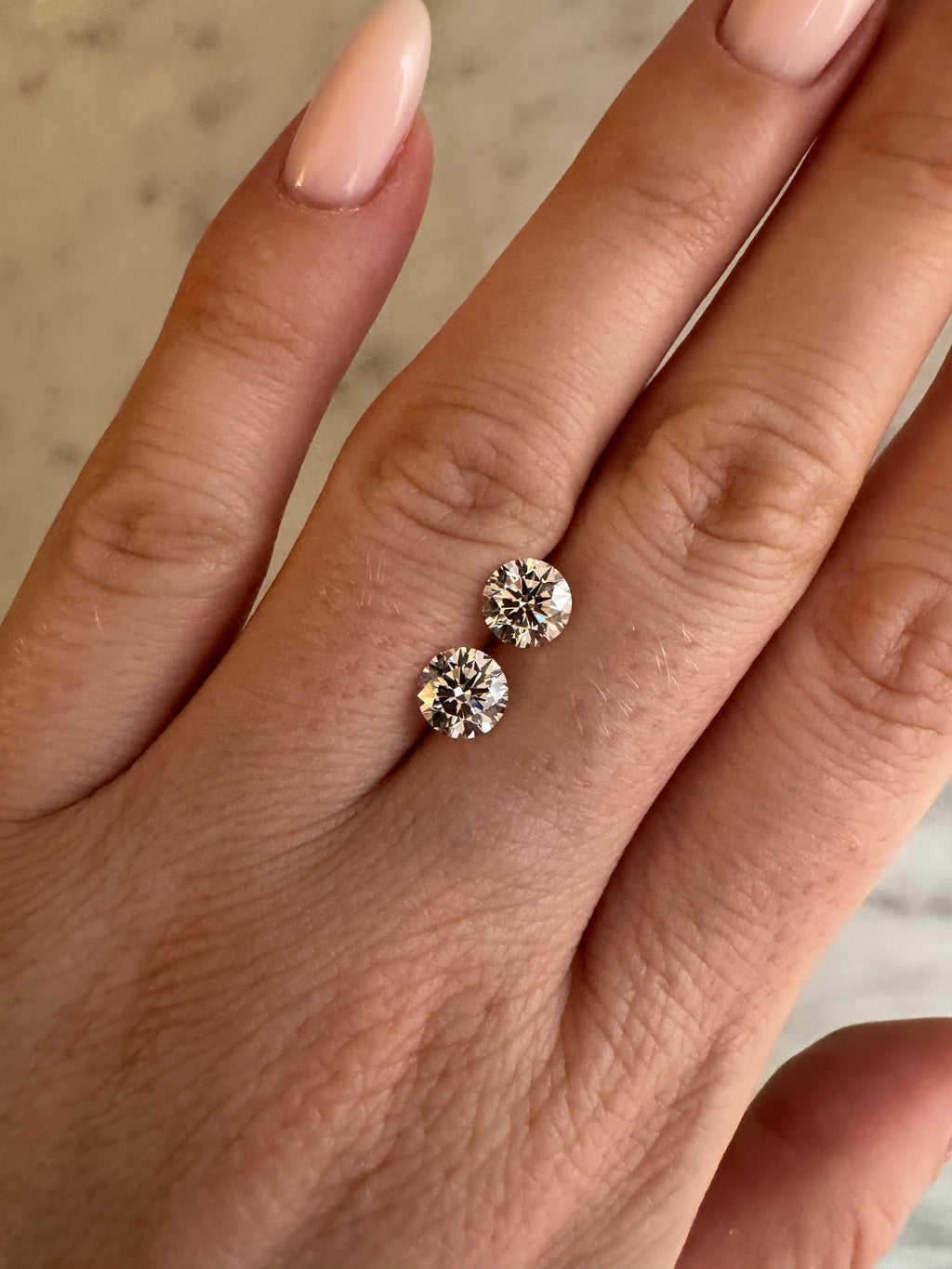 Matched Pair | Round | 2.11ctw D/E VVS1 | IGI Certified 640483864, 634460975