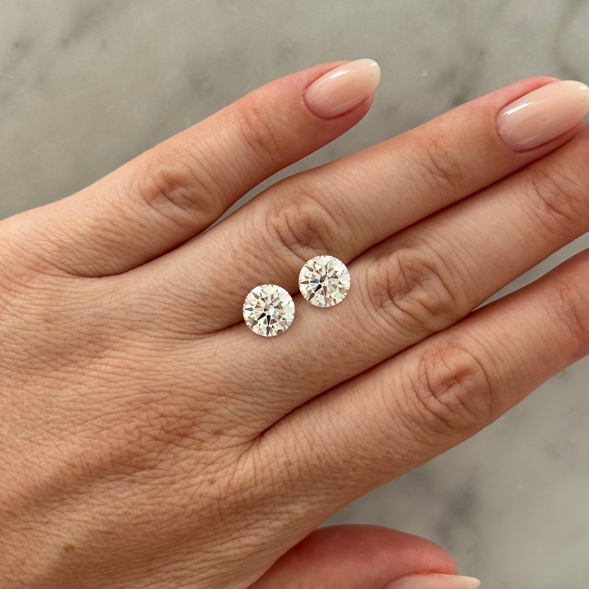 Round Matched Pair | 5.14ctw E VS1 | 1.00 ratio | IGI Certified 787610388, 765639244
