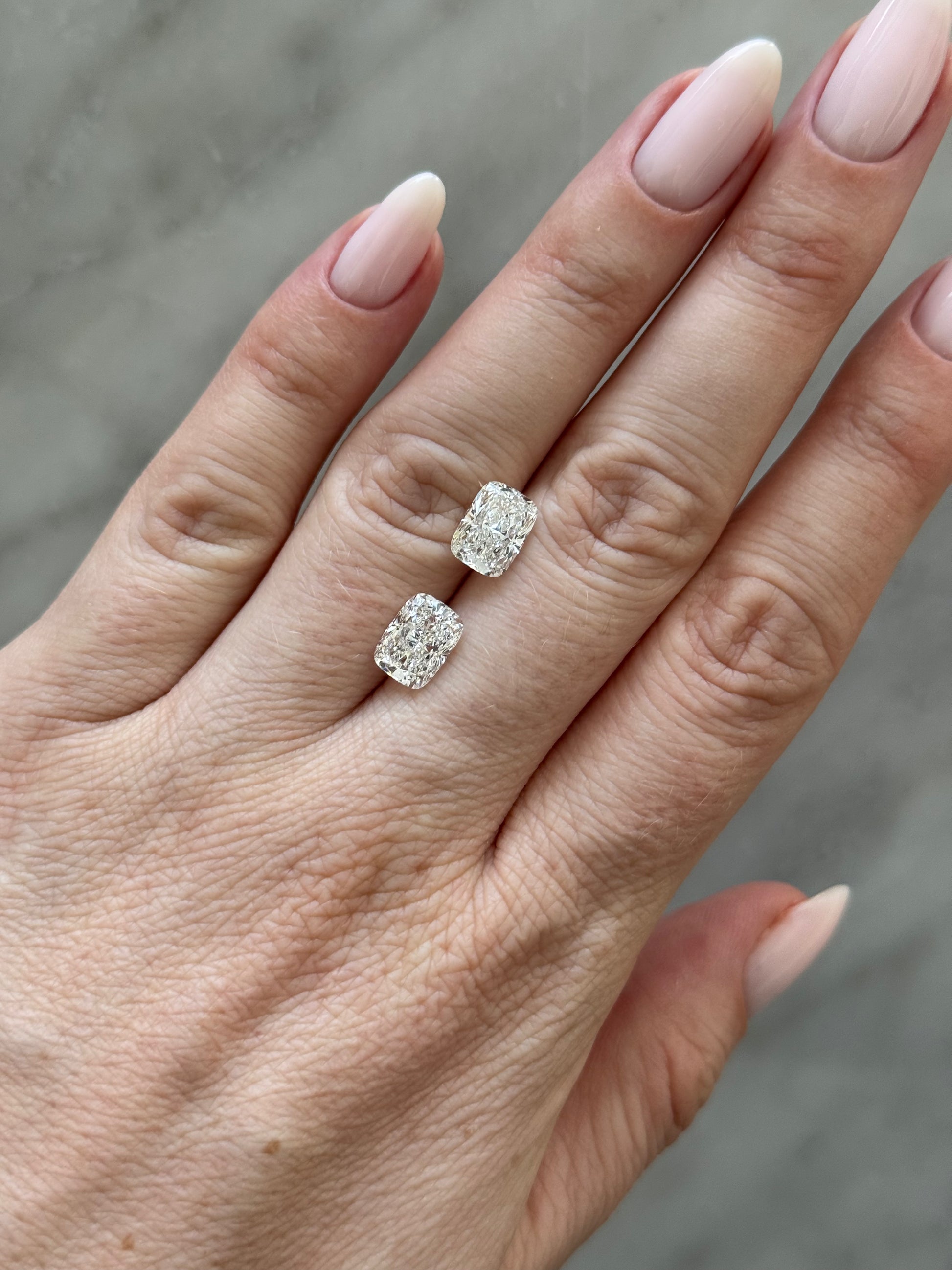 Matched Pair Cushion Long | 4.08ctw D/E VS1 | 1.36 ratio | IGI Certified 768688666, 764679222