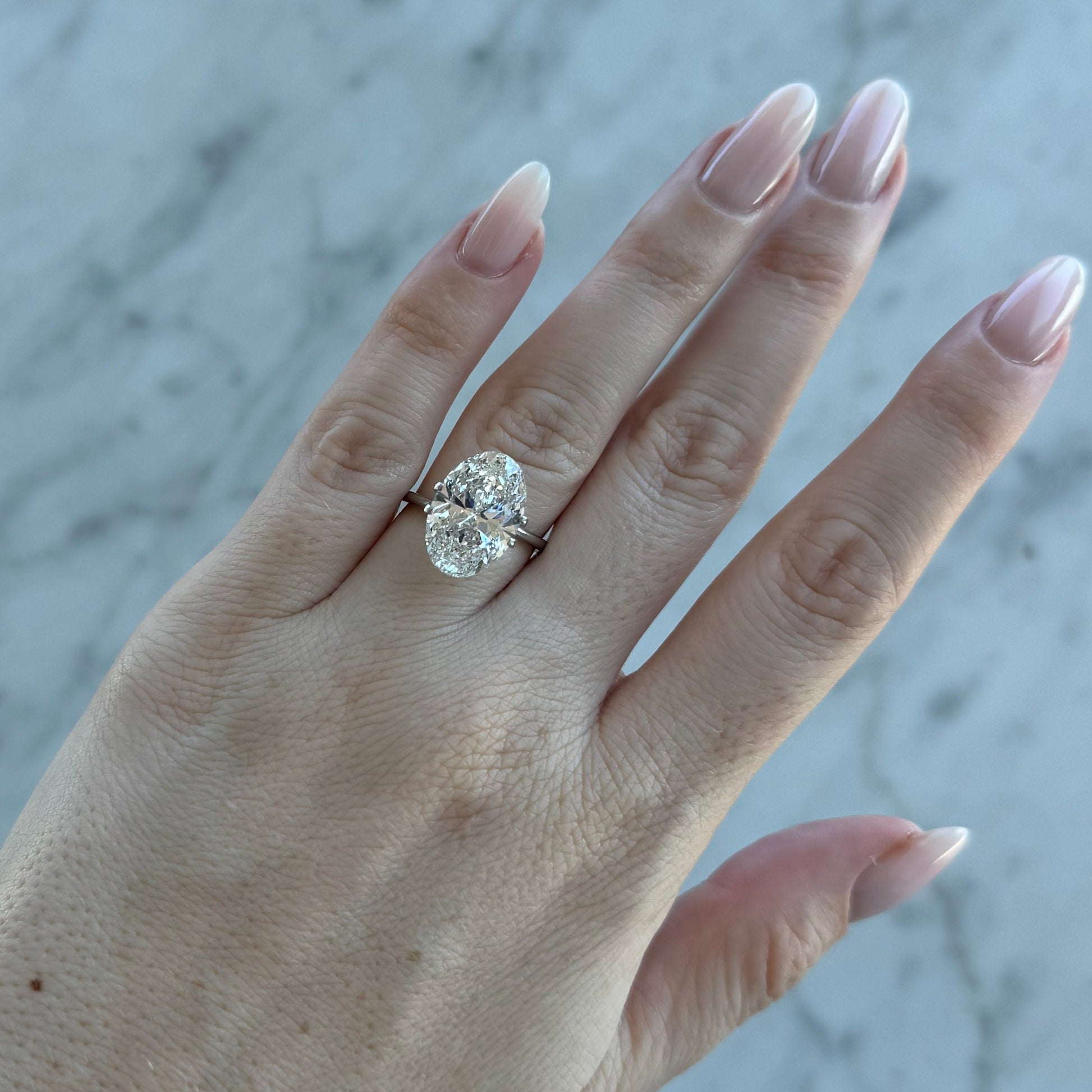 Oval | 7.01ct F VS1 | 1.48 ratio | IGI Certified 637473140 | OV701