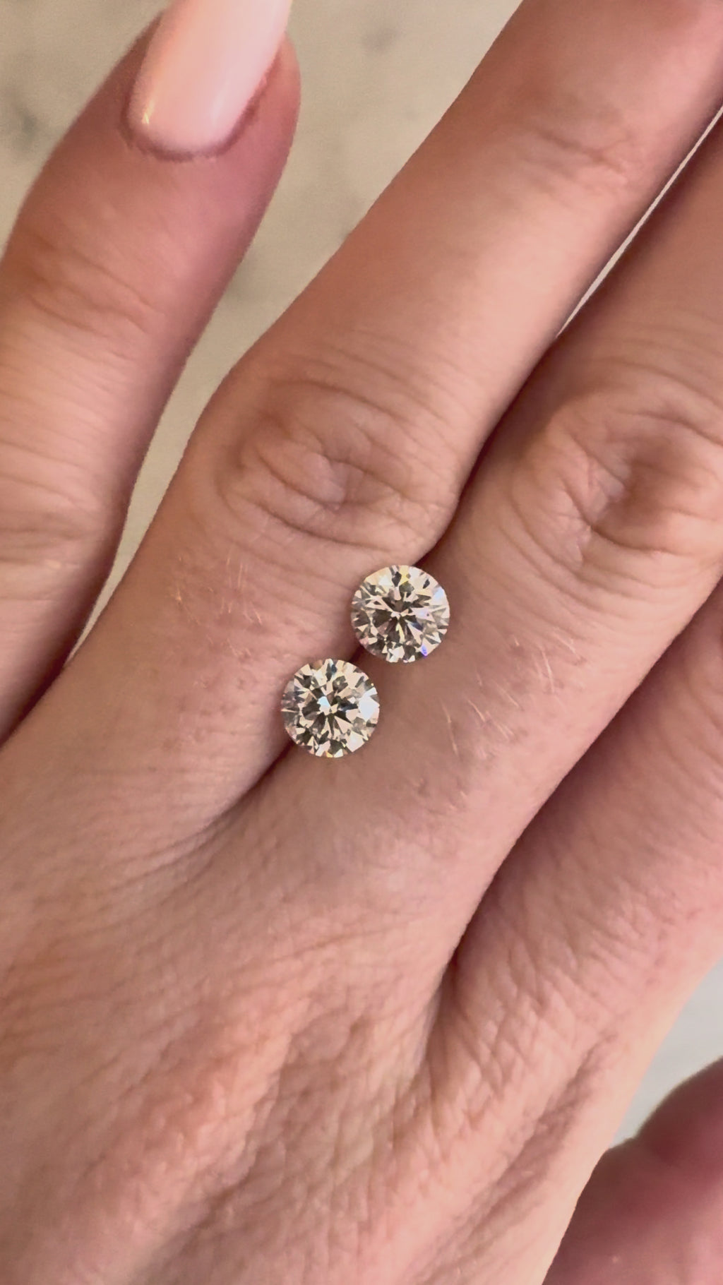 Matched Pair | Round | 2.11ctw D/E VVS1 | IGI Certified 640483864, 634460975